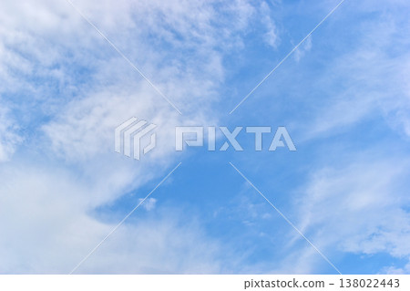 beautiful blue sky and white fluffy group of clouds with sunrise in the morning, natural background 138022443