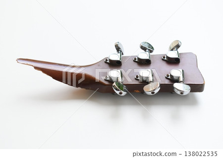 part of broken wood acoustic guitar isolated on white background part of broken wood acoustic guitar isolated on white background 138022535