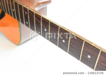 brown wood acoustic guitar isolated on white background brown wood acoustic guitar isolated on white background 138022536