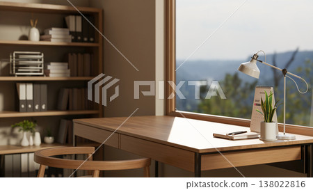 Book and calendar with potted plant under desk lamp on wooden table aside glass wall window and shelf. Book and calendar with potted plant under desk lamp on wooden table aside glass wall window and shelf. 138022816