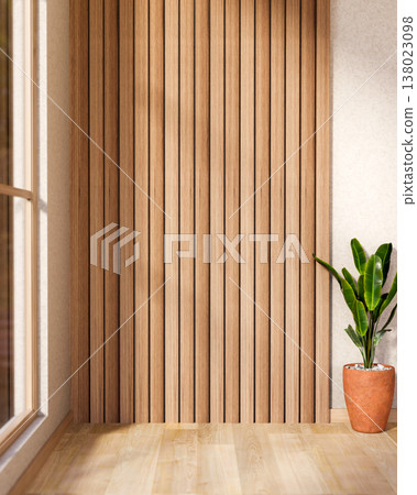 Potted plant on wooden parquet floor and slat wall with sunlight shine through window in room corner Potted plant on wooden parquet floor and slat wall with sunlight shine through window in room corner 138023098