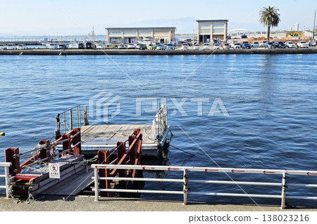 Pier located in a harbor at enoshima island. it is a famous landmark of Fujisawa, Japan. Pier located in a harbor at enoshima island. it is a famous landmark of Fujisawa, Japan. 138023216
