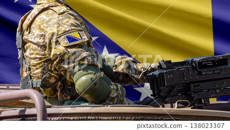 Bosnia and Herzegovina flag with soldier at machinegun turret Bosnia and Herzegovina flag with soldier at machinegun turret 138023307
