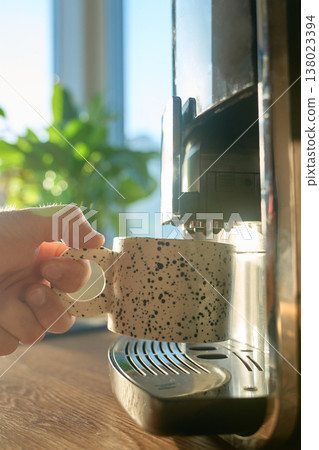 Person drinking coffee in the morning 138023394