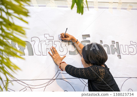 Woman Drawing Thai Lettering 138023734