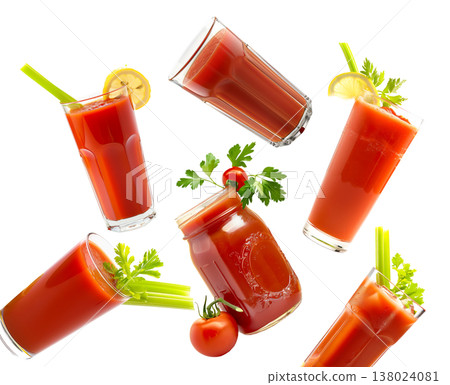 Multiple tomato juice glasses with celery and herbs isolated on white background, concept of freshness 138024081