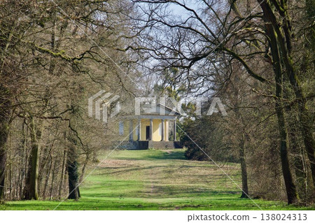 Neoclassical Garden Pavilion in a Spring Park with Ancient Trees. 138024313