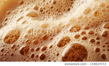 Foamy beer beverage bubbles in macro style on warm glowing background, representing freshness and effervescence Foamy beer beverage bubbles in macro style on warm glowing background, representing freshness and effervescence 138024553