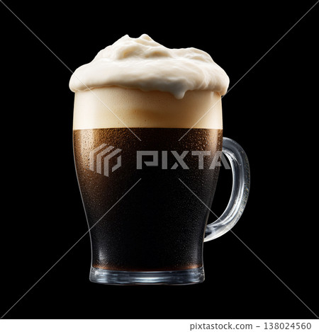 Foamy dark stout beer in a mug glass with creamy foam head, isolated on black background, concept of refreshment and taste 138024560