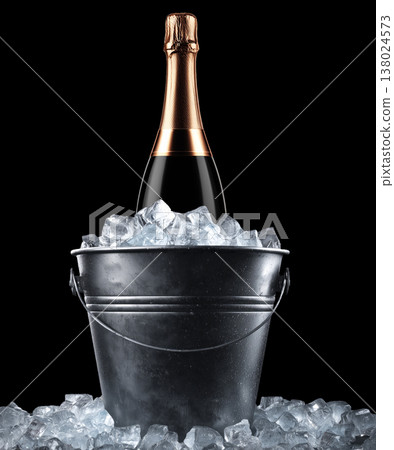 Champagne bottle in metal ice bucket, on black background with clipping path, concept of celebration 138024573