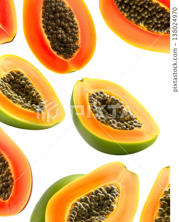 Multiple ripe papaya halves with dark seeds shown isolated on white background, representing a fresh tropical fruit concept 138024970