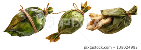 Venezuelan tamales wrapped in corn husk, tied with rustic rope, isolated on white background, representing South American cuisine 138024982