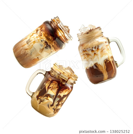 Iced Coffee with Ice Cubes in a Glass and a Straw, great for hot summer days Iced Coffee with Ice Cubes in a Glass and a Straw, great for hot summer days 138025252