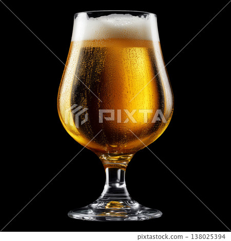 Foamy amber ale beer in a tall tulip glass with creamy foam head, isolated on black background, concept of refreshment and taste 138025394