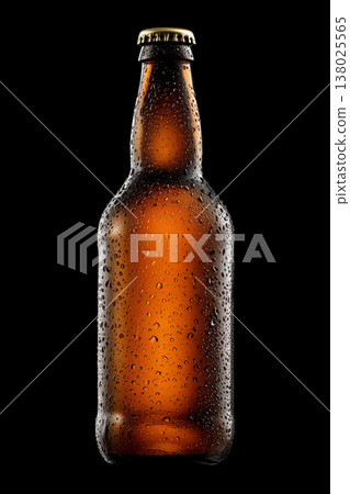 Chilled beer bottle covered in droplets isolated on a dark background with clipping path, concept of freshness and cold beverages Chilled beer bottle covered in droplets isolated on a dark background with clipping path, concept of freshness and cold beverages 138025565