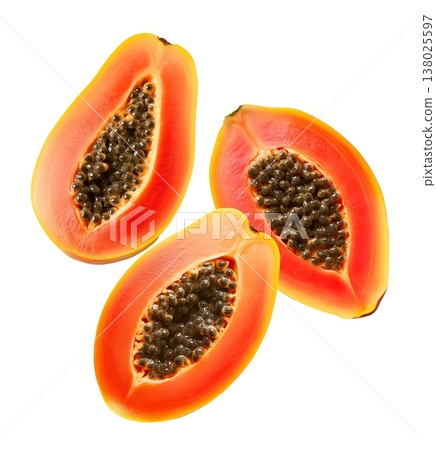Multiple ripe papaya halves with dark seeds shown isolated on white background, representing a fresh tropical fruit concept Multiple ripe papaya halves with dark seeds shown isolated on white background, representing a fresh tropical fruit concept 138025597
