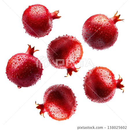 Multiple fresh red pomegranates with water droplets in a seamless pattern, isolated on a white background, concept of freshness Multiple fresh red pomegranates with water droplets in a seamless pattern, isolated on a white background, concept of freshness 138025602