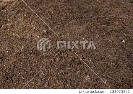 fertile soil mixed with various ingredients for growing seedlings and indoor plants, minerals and vitamins, humus and peat 138025831