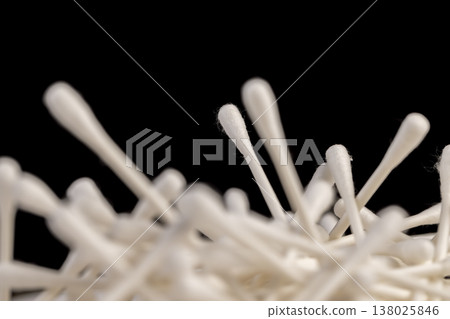 cotton swabs with natural cotton for hygiene , white paper natural sticks with natural white cotton for makeup correction , injury treatment, close up 138025846