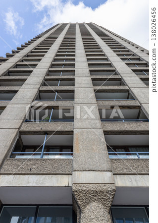 Upward view of modern high rise concrete apartment building exterior Upward view of modern high rise concrete apartment building exterior 138026456