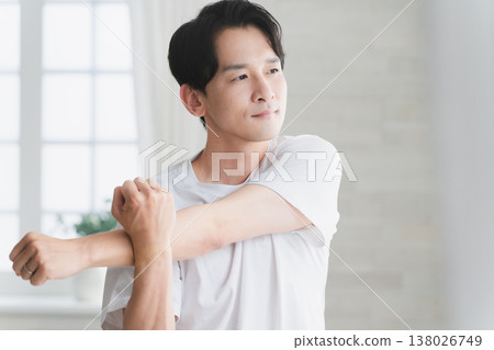 Young man wearing a T-shirt Lifestyle image Young man wearing a T-shirt Lifestyle image 138026749