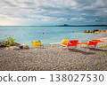 Amazing beach with colorful sunbeds on the shore, Lake Garda 138027530