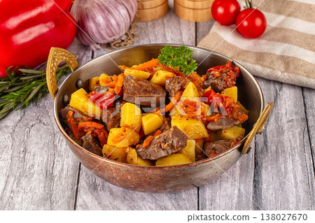 Rogiut with meat, potato and tomatoes Rogiut with meat, potato and tomatoes 138027670