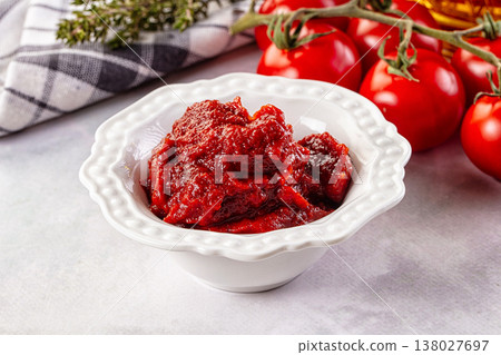 Red organic fresh tomato paste 138027697