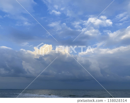 Cloudy sky with sunlight over ocean Cloudy sky with sunlight over ocean 138028314