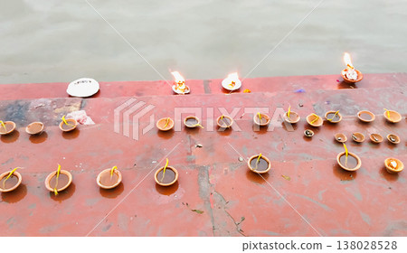 Clay Oil Lamps (Diyas) on Ghat Steps Near Yamuna River Clay Oil Lamps (Diyas) on Ghat Steps Near Yamuna River 138028528