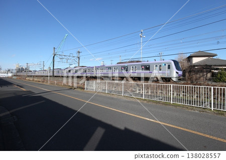Tobu Isesaki Line: A train running through the suburbs. Tobu Isesaki Line: A train running through the suburbs. 138028557