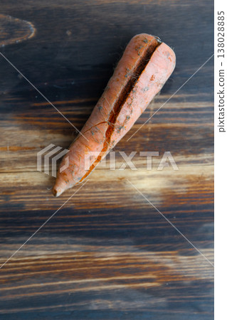 Organic carrots with soil still attached 138028885