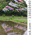 Carp streamers reflected on the water at Tachibana Fureai Park in Katori City. 138028940