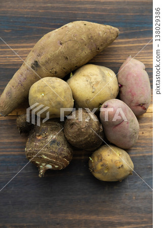 Organic, untreated potatoes with soil still attached Organic, untreated potatoes with soil still attached 138029386