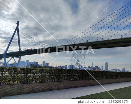A vast sky, a bridge, and a Ferris wheel A vast sky, a bridge, and a Ferris wheel 138029575