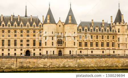 Conciergerie historic building along the Seine River in Paris, France, showing gothic medieval architecture 138029694