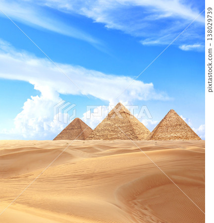 Famous Great Pyramids of Menkaure, Chephren and Cheops, Cairo, Egypt. Three iconic Great Pyramids and beautiful sand dunes, Giza Necropolis, have become a popular destination for travellers Famous Great Pyramids of Menkaure, Chephren and Cheops, Cairo, Egypt. Three iconic Great Pyramids and beautiful sand dunes, Giza Necropolis, have become a popular destination for travellers 138029739