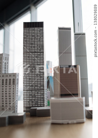 A collection of detailed miniature building models arranged to resemble a bustling city skyline A collection of detailed miniature building models arranged to resemble a bustling city skyline 138029889