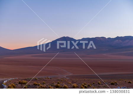 Serene desert mountain landscape under tranquil twilight sky in Andes 138030831