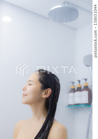 A woman relaxing in the bathroom A woman relaxing in the bathroom 138031044