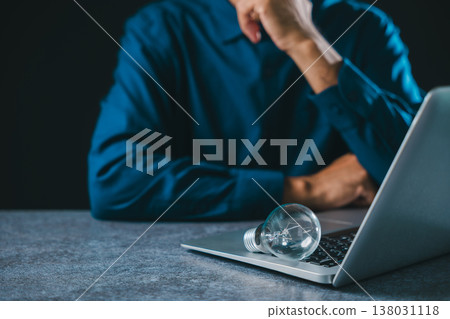 Ai drives creative future technology innovation, bright lightbulb represents business idea concept digital solutions with person working on modern laptop 138031118