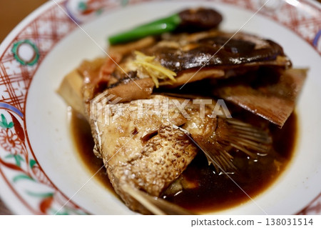 Braised sea bream head and bones. A classic sweet and savory braised dish. 138031514