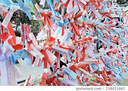 Japanese fortune-telling paper strips found at Enoshima Shrine Japanese fortune-telling paper strips found at Enoshima Shrine 138031662