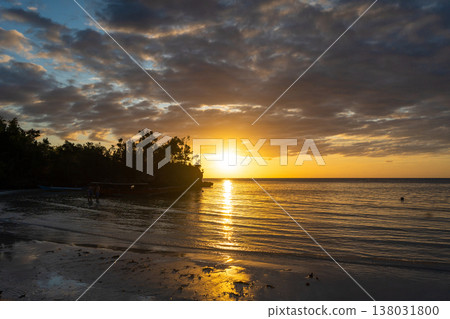 Sunset on Lia beach, Waleakodi Island, Togian archipelago, Sulawesi, Indonesia Sunset on Lia beach, Waleakodi Island, Togian archipelago, Sulawesi, Indonesia 138031800