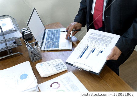 close up image of manager on desk, executive marketing analyst 138031902