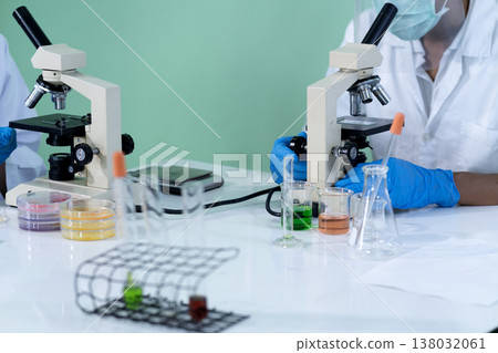 team of scientists is preparing to isolate tissue for research in laboratory 138032061