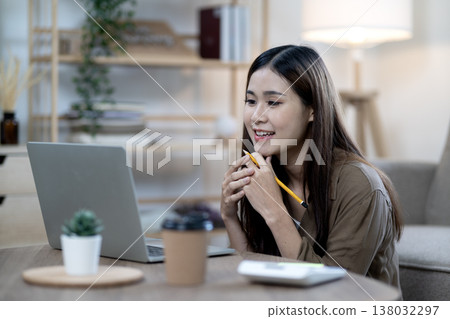 woman concept work from home with stationery calculator and coffee cup woman concept work from home with stationery calculator and coffee cup 138032297