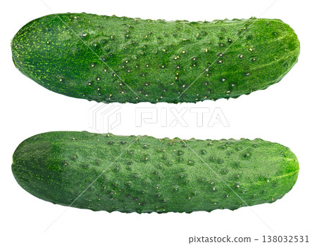Two fresh green cucumbers isolated on white background Two fresh green cucumbers isolated on white background 138032531