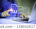 Tax concept with digital tax documents and businessman working on laptop for accounting and finance 138032617