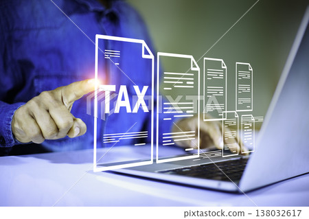 Tax concept with digital tax documents and businessman working on laptop for accounting and finance Tax concept with digital tax documents and businessman working on laptop for accounting and finance 138032617